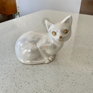 Vintage white iridescent Cat figurine with gold facial features