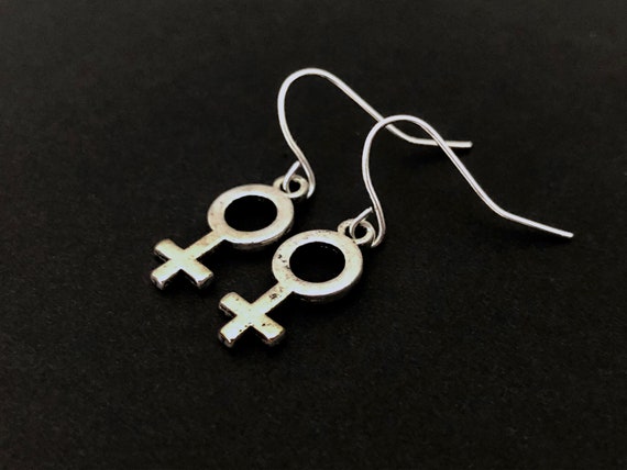 female gender symbol earrings