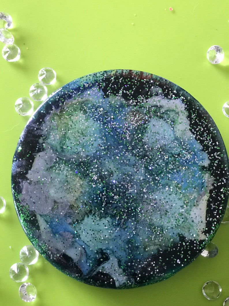 Pair of green glitter abstract floral coasters