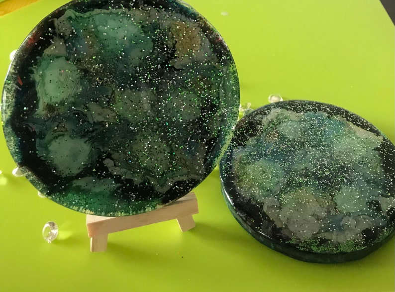 Pair of green glitter abstract floral coasters