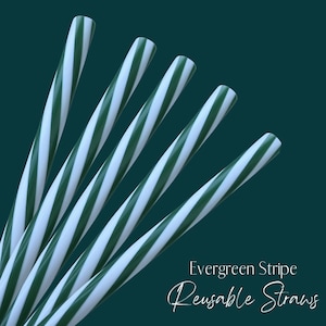 May include: Close-up of six reusable straws with a green and white striped pattern. The straws are arranged diagonally against a dark teal background. The text "Evergreen Stripe Reusable Straws" is in the bottom right corner.
