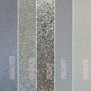 May include: Five vertical strips showcasing glitter textures in shades of gray and white. The strips are labeled "Smoke", "Cloud", "Flint", "Frost", and "White" in a stylized font. The glitter varies in size and sparkle, creating a range of visual effects.