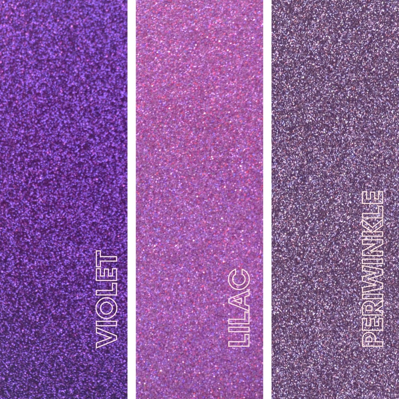 May include: Three vertical panels of glitter in shades of purple. The left panel is labeled "VIOLET", the middle panel is "LILAC", and the right panel is "PERIWINKLE". The glitter has a fine texture and reflects light.