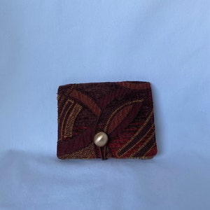 Cartera pequeña de chenilla burdeos