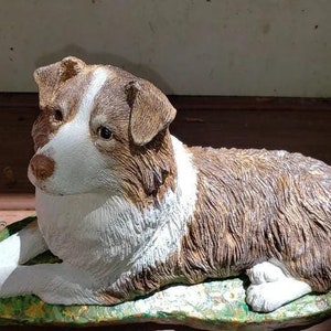 Australian Shepherd Dog Concrete statue Measuring  5 x 11 at the base, 6-1/2" tall, and weighing nearly 8 lbs A good size for an outdoor memory garden or grave marker and still a nice size for indoor use on a mantel desk bookshelf. Pet loss gift.
