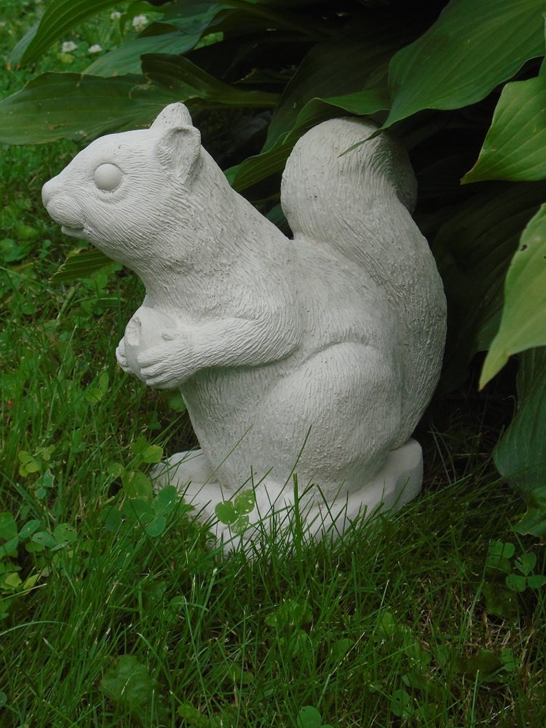 cement squirrel statue