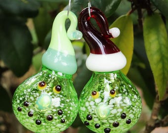 The "Sninch" Funny Grinchy Glass Ornament in 2 Santa Hat Colors Sninch Whimsical Handblown Glass Cartoon Ornament Christmas Best Seller