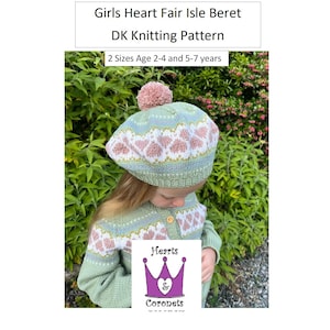 May include: A green and pink Fair Isle knit beret with a white pom pom on top. The beret is for ages 2-4 and 5-7 years. The pattern is called "Girls Heart Fair Isle Beret" and is a DK knitting pattern. The image also includes the logo "Hearts & Coronets".