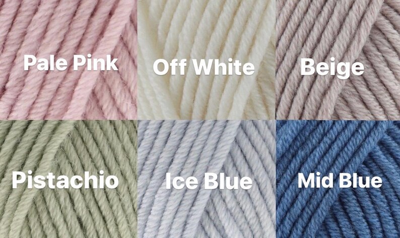 May include: Six yarn skeins in different colors: pale pink, off white, beige, pistachio, ice blue, and mid blue.