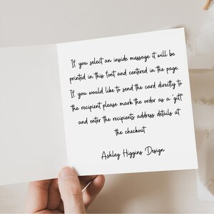 May include: A white greeting card with black handwritten text. The text provides instructions for sending a card directly to a recipient and includes the designer's name, "Ashley Higgins Design."