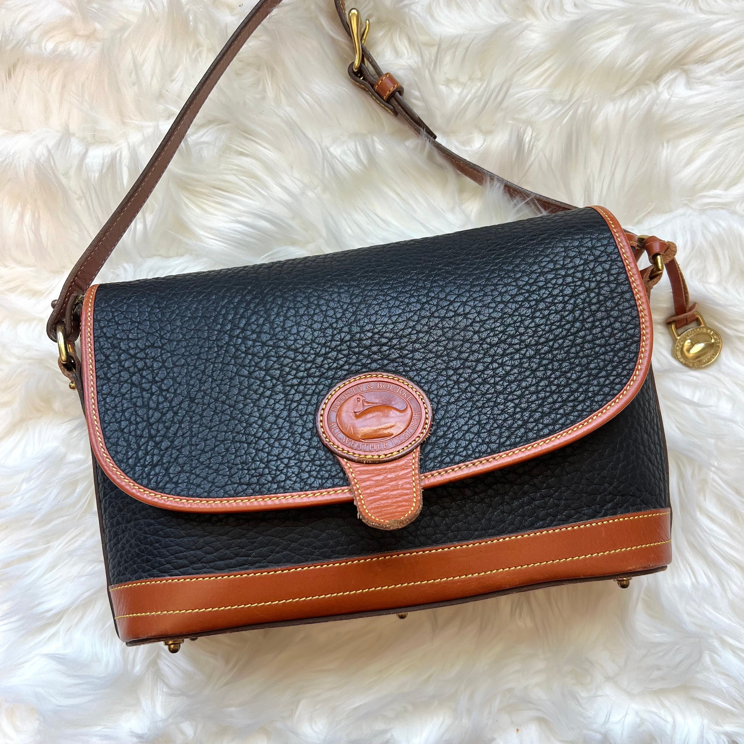 Dooney and bourke navy and tan purse on sale