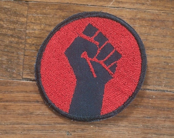 Resist Fist Embroidered Patch Red on Black Canvas Protest Radical Resistance