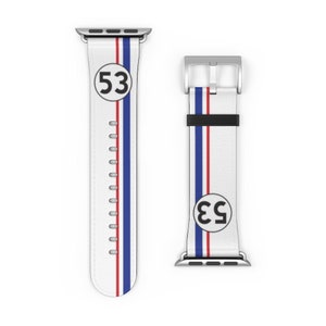 May include: White Apple Watch band with red and blue stripes and a black circle with the number "53" in white.