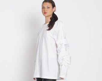 Haut confortable à manches longues pour femme. Blouse bohème blanche en grande taille