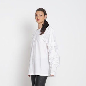 Comfortable long sleeved top for women. White bohemian blouse in plus size