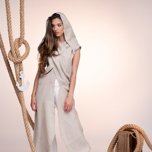 Futuristic hooded tunic top for women, avant garde clothing available in plus sizes and other colors. Adult costumes