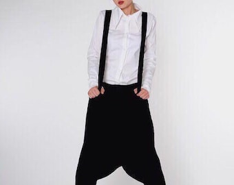 Black drop crotch women pants in harem style. Oversized high rise wide leg baggy fit pants