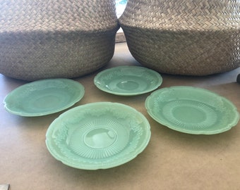 This listing is for 4 Alice Jadite Fireking saucers