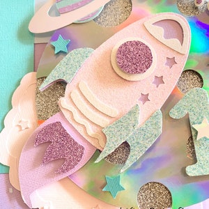 Adorno para pastel con forma de cohete, decoración brillante para fiesta de cumpleaños con temática espacial.