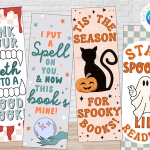 May include: Four Halloween themed bookmarks with different designs. The first bookmark has a vampire's mouth with the text "Sink your teeth into a good book!" The second bookmark has a hand holding a crystal ball with the text "I put a spell on you, & now this book's mine!" The third bookmark has a black cat and a pumpkin with the text "Tis' the season for spooky books!" The fourth bookmark has a ghost with the text "Stay spooky lil' reader!"