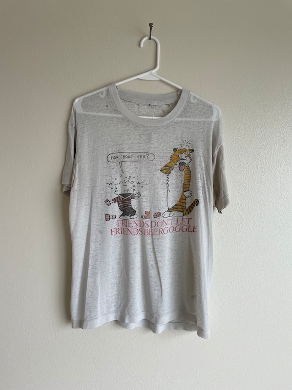 Calvin and Hobbes bootleg shirt - paper thin, dis… - image 1