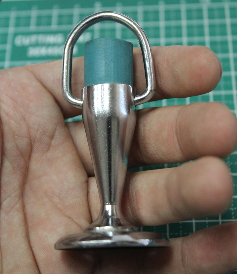 It was made in the USSR in the 1970s. This vintage door stopper for door is made of metal and plated with chrome It was made in the USSR in the 1970s. This vintage door stopper for door is made of metal and plated with chrome