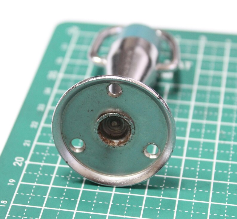 It was made in the USSR in the 1970s. This vintage door stopper for door is made of metal and plated with chrome It was made in the USSR in the 1970s. This vintage door stopper for door is made of metal and plated with chrome