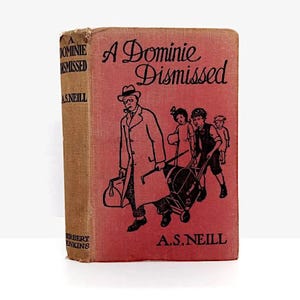 May include: Vintage book titled "A Dominie Dismissed" with a red cover and illustrations of a man with children. The book's spine is tan, and the author's name, A.S. Neill, is visible. Published by Herbert Jenkins.