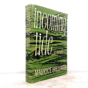May include: A hardcover book titled Incoming Tide by Maurice Hilliard. The dust jacket features a green background with black abstract horizontal lines and white text. The title is printed in large white letters on the front cover and spine.