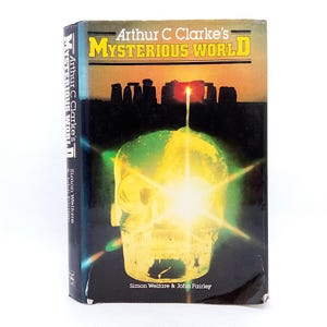 Arthur C Clarke&#39;s Mysterious World strange phenomena unexplained mysteries UFO Bigfoot paranormal book vintage 1980s illustrated hardback