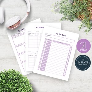 Puede incluir: Páginas de planificador imprimibles con un diseño morado y blanco. Las páginas incluyen secciones para "Mi diario de dieta", "Entrenamientos" y "Lista de tareas".