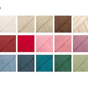 Puede incluir: Una colecci&oacute;n de madejas de hilo en varios colores, incluyendo blanco, beige, marr&oacute;n, rojo, rosa, azul y verde. El texto "2nd edition" est&aacute; en la parte superior. Ideal para proyectos de tejido y ganchillo.
