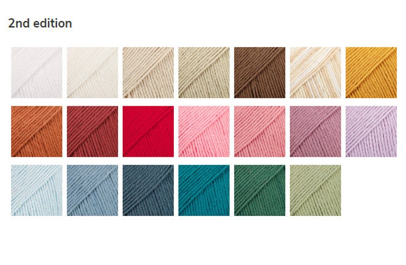 Puede incluir: Una colecci&oacute;n de madejas de hilo en varios colores, incluyendo blanco, beige, marr&oacute;n, rojo, rosa, azul y verde. El texto "2nd edition" est&aacute; en la parte superior. Ideal para proyectos de tejido y ganchillo.