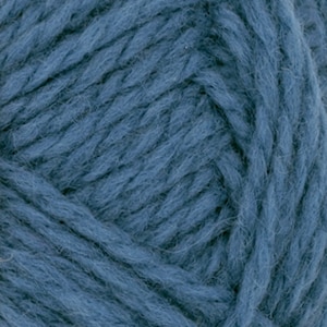 May include: A close-up view of a skein of thick, deep blue yarn. The fibers are twisted into a multi-ply strand with a soft, slightly fuzzy texture. The individual threads are clearly visible, showing a consistent, rich blue color throughout the entire surface of the yarn ball.