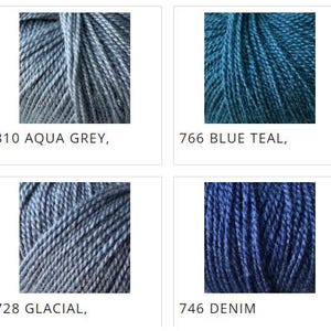 May include: A collection of eight skeins of yarn in various shades of blue and teal. Each skein is labeled with a color name and number, including "Petrol," "Aqua Grey," "Blue Teal," "Teal, Unica," "Aqua Lagune," "Glacial," "Denim," and "Navy Blue."