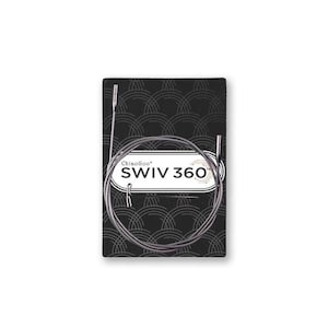 May include: A silver-colored circular knitting needle cable coiled on a black rectangular card. The card features a white label with the text "ChiaoGoo SWIV 360" and a repeating white arc pattern. The cable has metal connectors at both ends.