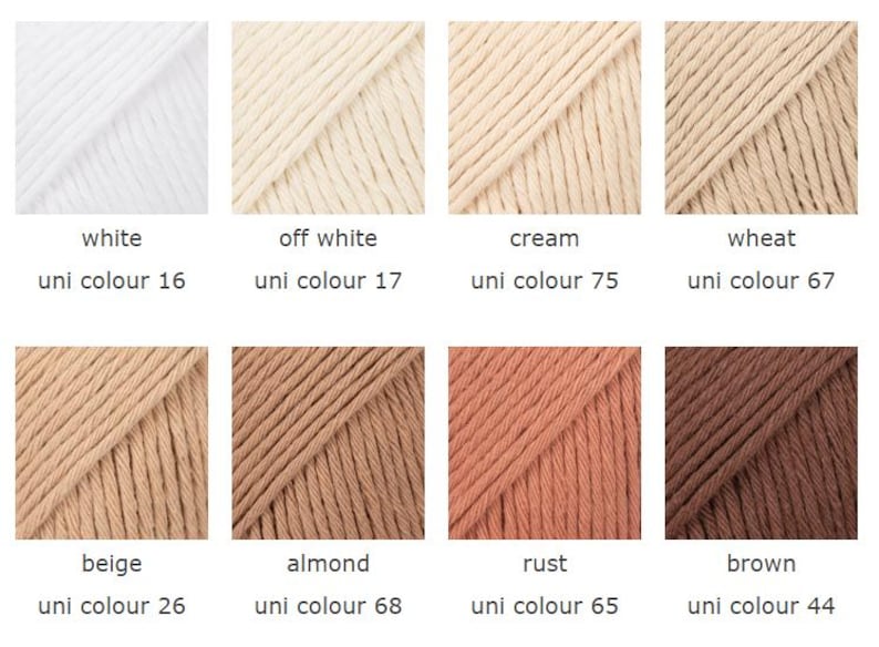 K&ouml;nnte beinhalten: Acht Garnproben in verschiedenen neutralen Farbt&ouml;nen, darunter Wei&szlig;, Off-White, Creme, Weizen, Beige, Mandel, Rost und Braun. Jede Probe ist mit ihrem Farbnamen und einer "Uni Colour"-Nummer versehen.