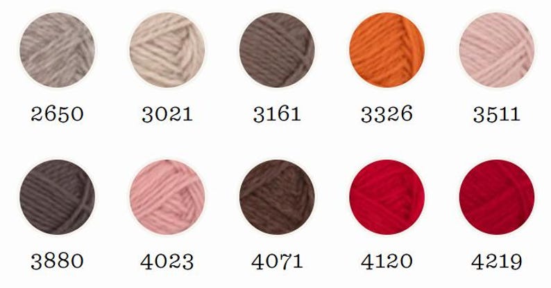 May include: A color chart featuring ten circular yarn samples in shades of gray, beige, brown, orange, pink, and red. Each sample is labeled with a numerical code: 2650, 3021, 3161, 3326, 3511, 3880, 4023, 4071, 4120, and 4219, arranged in two rows.