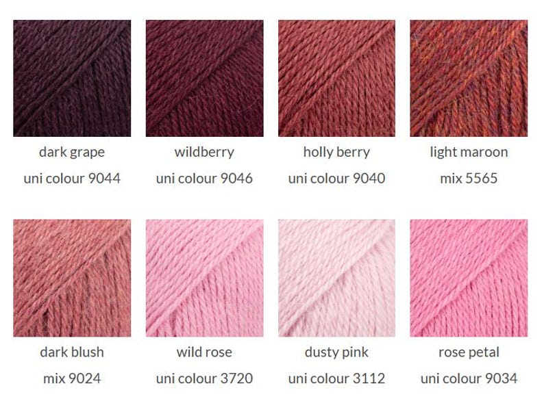 May include: A grid of eight yarn samples in various shades of pink, red, and purple. The colors are labeled as dark grape 9044, wildberry 9046, holly berry 9040, light maroon 5565, dark blush 9024, wild rose 3720, dusty pink 3112, and rose petal 9034.