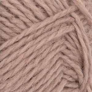 May include: A close-up view of dusty rose colored yarn, showing the twisted fiber strands and the soft, fuzzy texture of the material. The individual plies are clearly visible, creating a dense, uniform pattern across the entire surface.