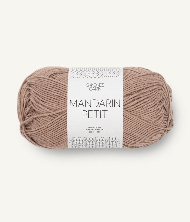 May include: A ball of brown yarn with a white label that reads 'Sandnes Garn', 'Mandarin Petit', 'Den Norske Garnfabrikken Siden 1888'.