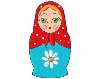 May include: A red and white polka dot nesting doll with a blue dress and a white daisy on the front. The doll has a blonde hair, green eyes, and a red scarf.