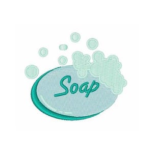 May include: An embroidered design of a bar of soap with the word "Soap" in a script font. The soap is light blue with a teal border and is surrounded by bubbles and suds. The design is on a white background.