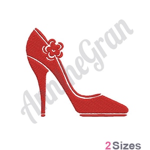 May include: Red high-heeled shoe with a flower detail on the side.
