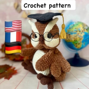 May include: A crocheted owl wearing a graduation cap and glasses. The owl is brown and white with a yellow tassel. The text "Crochet pattern" is displayed above the owl.