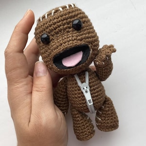 PDF lesson on crocheting a boy based on a computer game