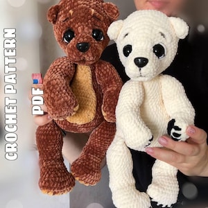 May include: Two plush crochet bears, one dark brown with a tan belly and one cream-colored, both featuring large black safety eyes, black noses, and textured yarn. The text CROCHET PATTERN PDF is visible on the left side of the image.