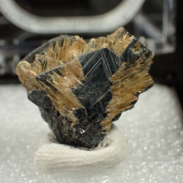 Rutile on Hematite from Brazil. Mineral specimen. Crystal. Rough. Raw.