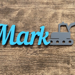 Nameplate, lettering, door sign with excavator motif