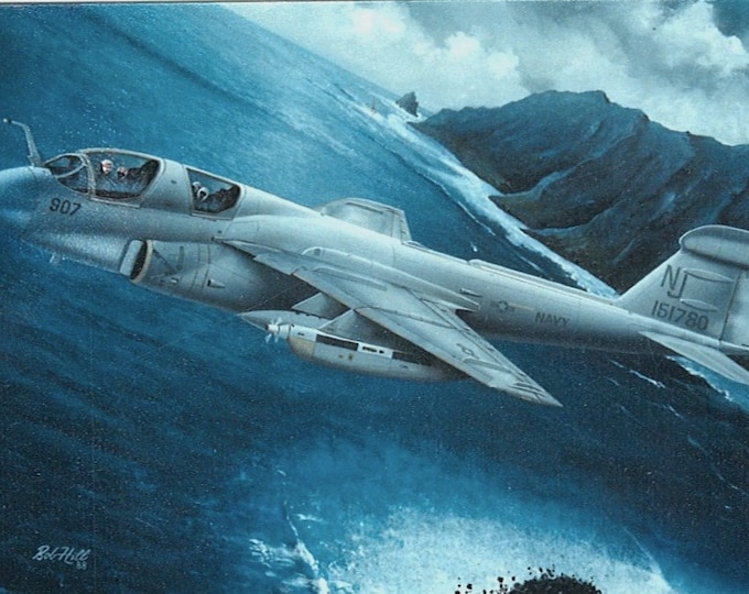Framed 4" X 6" Print of a Grumman EA-6B "Prowler" on a radar jamming mission. Hang on wall or display on a shelf.